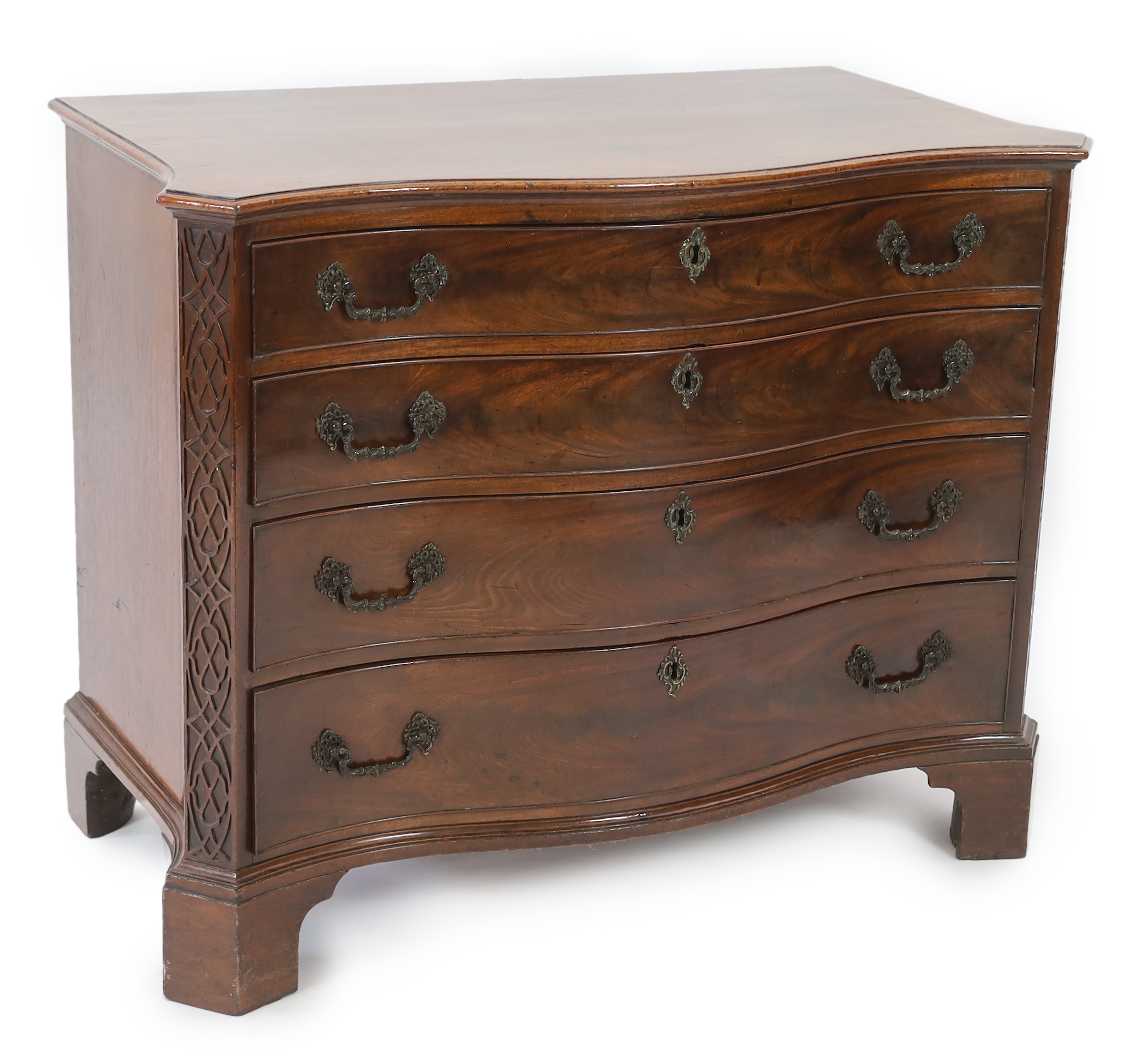 A George III Chippendale serpentine mahogany chest